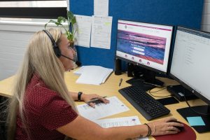 Your Online Property Settlement Staff member working with Client 